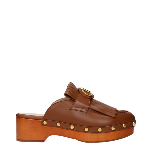 Valentino Garavani Brown Leather Slippers Curated Luxury Accessories by Orvyn