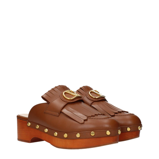 Valentino Garavani Brown Leather Slippers Curated Luxury Accessories by Orvyn