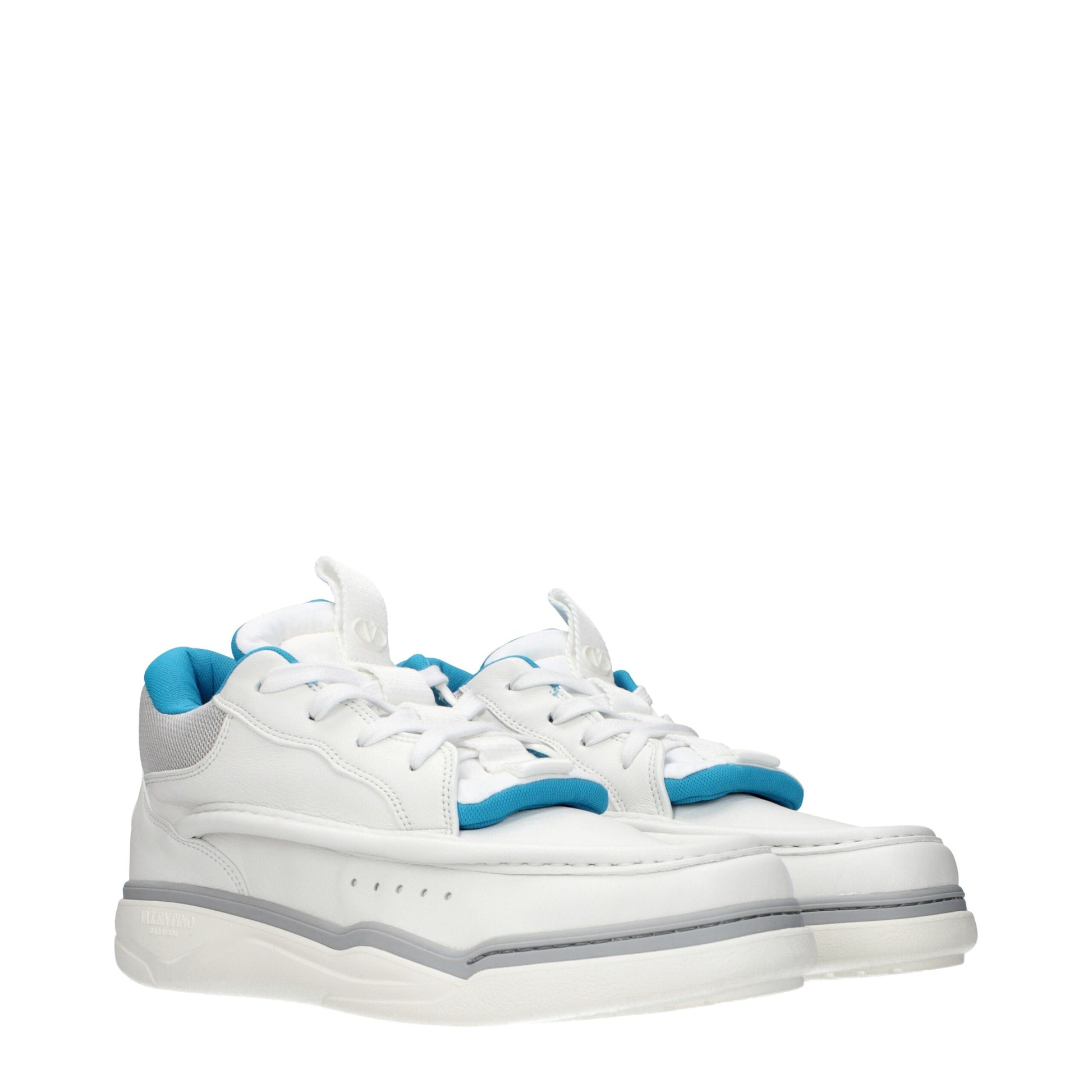 Valentino Garavani White Leather Low Top Sneakers Curated Luxury Accessories by Orvyn