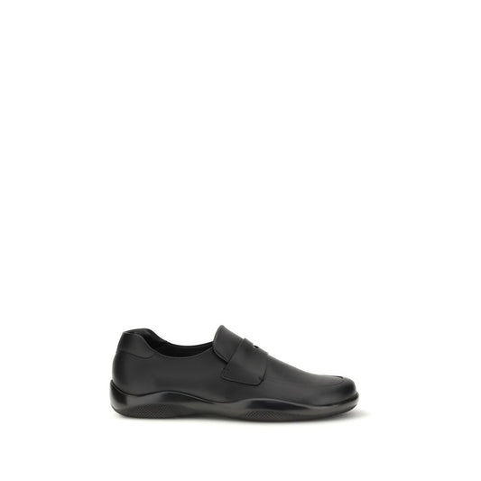 Prada Black Calf Leather Bos Taurus Slip-On Loafers Curated Luxury Accessories by Orvyn