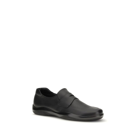 Prada Black Calf Leather Bos Taurus Slip-On Loafers Curated Luxury Accessories by Orvyn